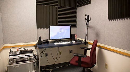 Editing room 3, showing the desk, chair, microphone, and multimedia conversion station