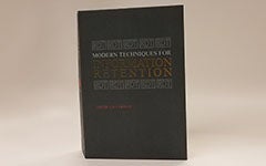 "Modern Techniques of Information Retention", a fake book hiding two cans of Red Bull energy drink