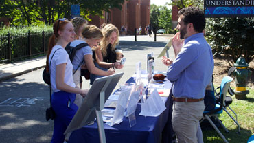 Students visiting a Library table