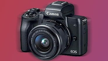 A Canon M50 mirrorless camera on a color gradient background.