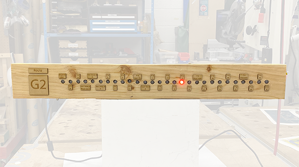 a wooden board with LEDs sticking out of it