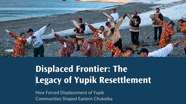 Image of people dancing on a beach from the StoryMap cover. 