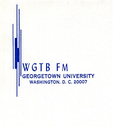 WGTB FM logo in blue ink on a white background