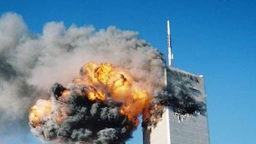 Explosion and fire at the top of the World Trade Center towers on 9/11/01