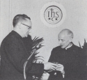 The Very Rev. Pedro Arrupe, S.J., Father General of the Society of Jesus receives the Seal of Georgetown from Georgetown University President Gerard J. Campbell, S.J.
