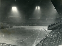 a black and white photograph of the field and stands of the Georgetown versus Wake Forest football game at Griffith Stadium, which took place on October 4, 1946