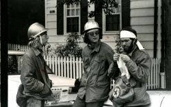 Black and white photograph of three student medics
