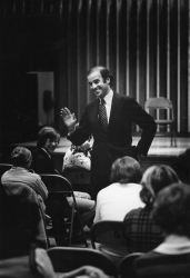 Back and white photograph of Senator Biden speaking to a seated audience