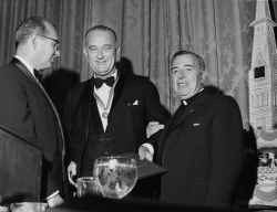 Black and white photograph of Lyndon Johnson wearing the John Carroll Medal
