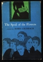 The dust jacket from The Spoil of the Flowers, showing a group of schoolgirls and teachers below the bottom of a painting of a woman with an open book in her lap