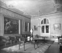 Carroll Parlor, showing the ceiling, a table, and the painting of Saint Matthew
