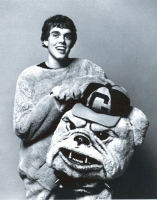 Student Lloyd Williams poses in the Jack mascot costume while holding the head of the costume in his hands