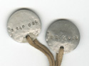 Close-up of reverse of dog tags, showing Tunnell's I.D. number