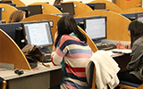 Students work on the computers in the Gelardin computing area