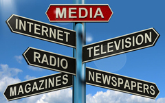 Sign post with arrows that read "Media," "Internet," "Television," "Radio," "Magazines," and "Newspapers"