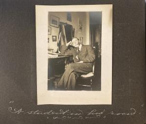 Kress scrapbook-a student in his room