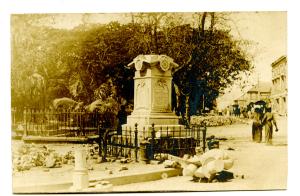 Postcard showing damage of DuPont Statue after 1907 earthquake