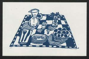 A still life in shades of blue and white with fruit, flowers, a pitcher of water, napkin with fork and knife on a checkered tablecloth