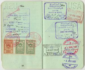 Two pages from the passport of Lisa Sergio, showing a visa and various stamps for entry into Syria