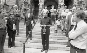 Photograph of group on Healy Hall before the blessing of the buses