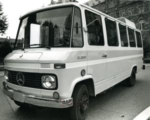 Black and white photograph of a GUTS bus in 1974