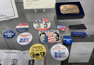 Various political campaign buttons and souvenirs