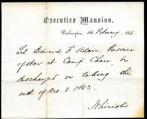 Discharge notice for Edward F. Blair, prisoner of war at Camp Chase, signed by Abraham Lincoln