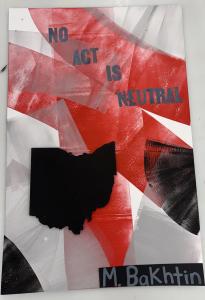 Cut out shape of the state of Ohio over pieces of red paper