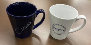 Photograph of two mugs, one blue, one white