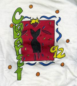 White t-shirt featuring a black cat on a red background