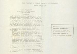 Typed document with a crease mark showing it has been folded in half