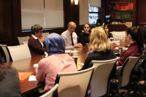 Curt Goering, who served for three decades as a Middle East Program Officer at Amnesty International before becoming Executive Director of the Center for Victims of Torture. He is pictured on the right speaking to MAAS students in 2017