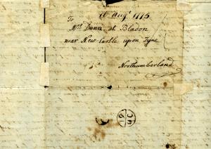 Address on back of letter written in black ink on paper.