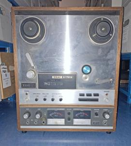 Color photograph of a reel to reel audio player labeled "WGTB-FM"