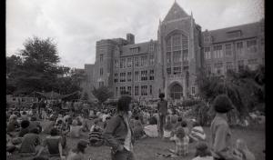 Black and white photograph showing a crowd of students on Copley Lawn enjoying Pandamedia.