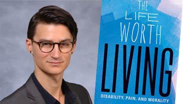 Joel Michael Reynolds with the cover of his book The Life Worth Living