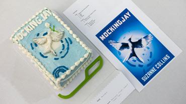 A cake recreating the cover of Mockingjay by Suzanne Collins.