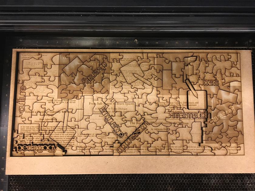 Puzzle on the bed of the laser cutter