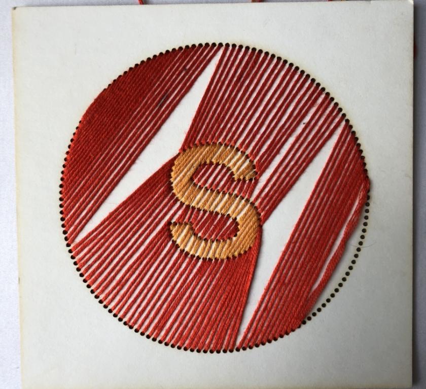 Embroidered letter "S"