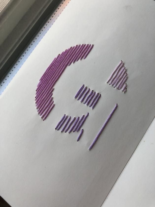 Embroidered letter "G"