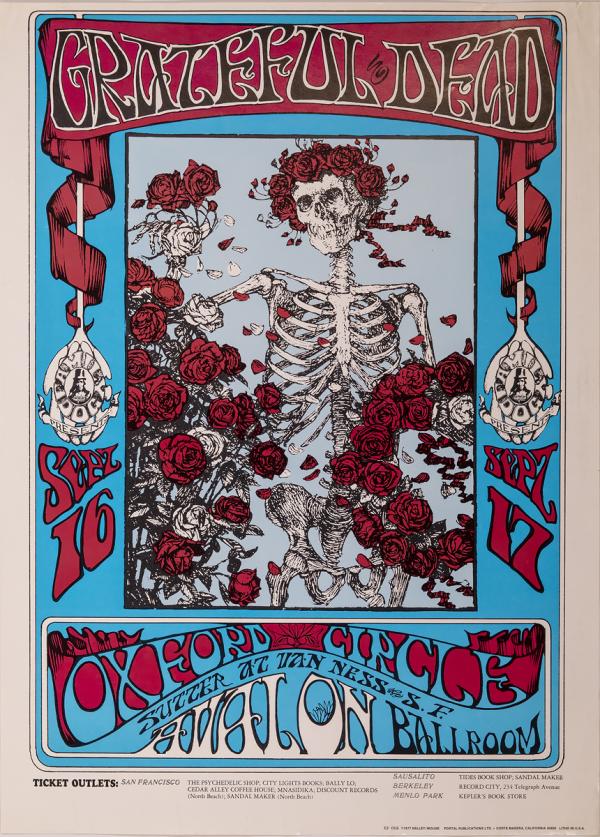 Concert poster with funky font and a large drawing of a skeleton surrounded by roses at the center.