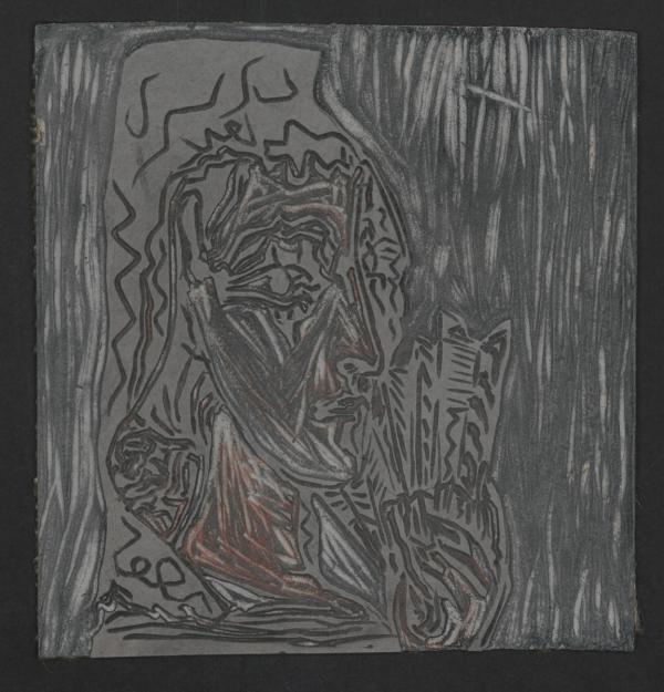 Linocut block with profile of an abstracted Picasso-like woman lies on a reddish-orange background.