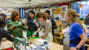 several women making printed holiday cards