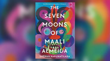 Cover of "The Seven Moons of Maali Almeida" depicting a colorful Sri Lankan mask.