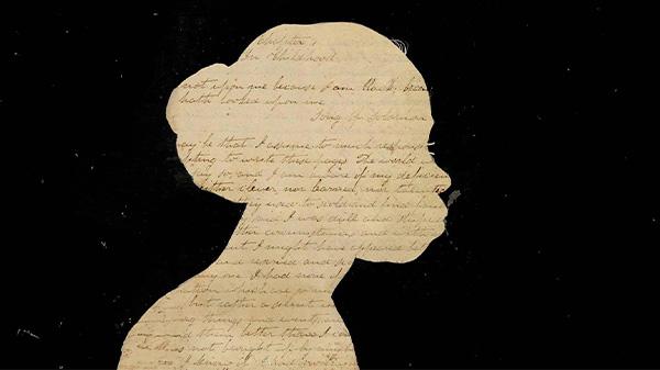 A silhouette of a woman's head filled with 18th-century handwriting on a plain black backrop.