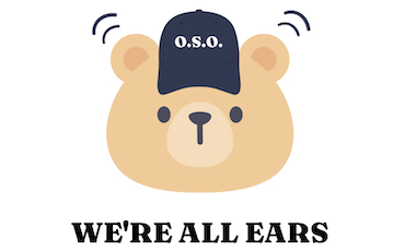 Teddy bear wearing a blue baseball cap with lines above ears that show it is listening