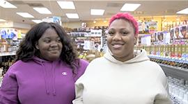 Two women in a beauty supply store