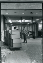 Photograph of books being moved in to the Library