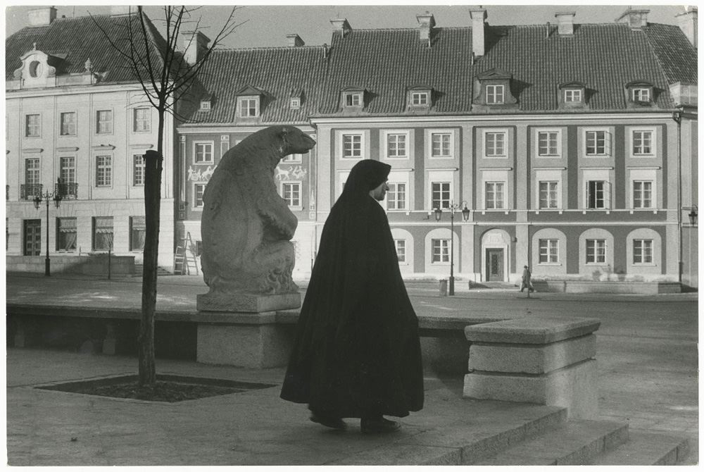 Nun Walking Past Sculpture of a Bear, Poland (1956)