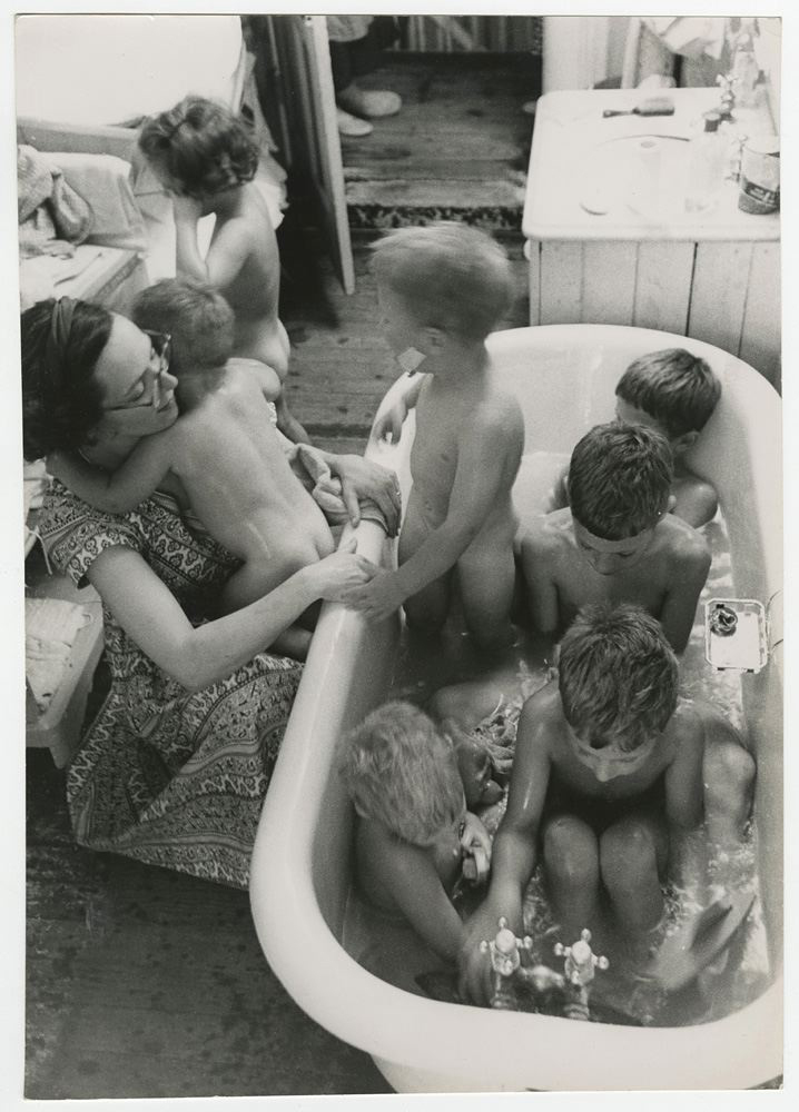 Woman Bathing Seven Children